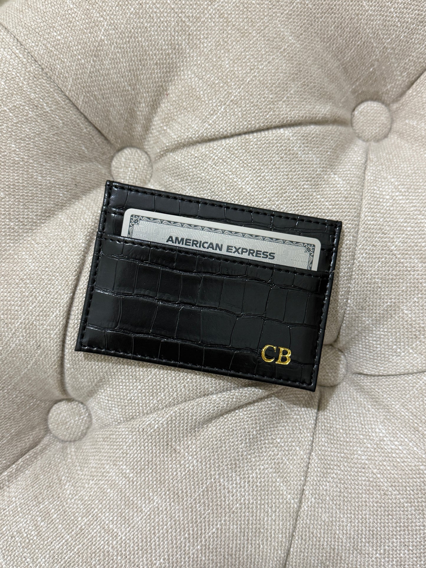 Black crocodile vegan leather cardholder with a gold monogram