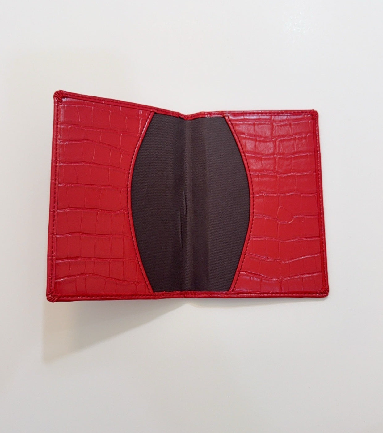 Inside of red vegan crocodile passport holder 