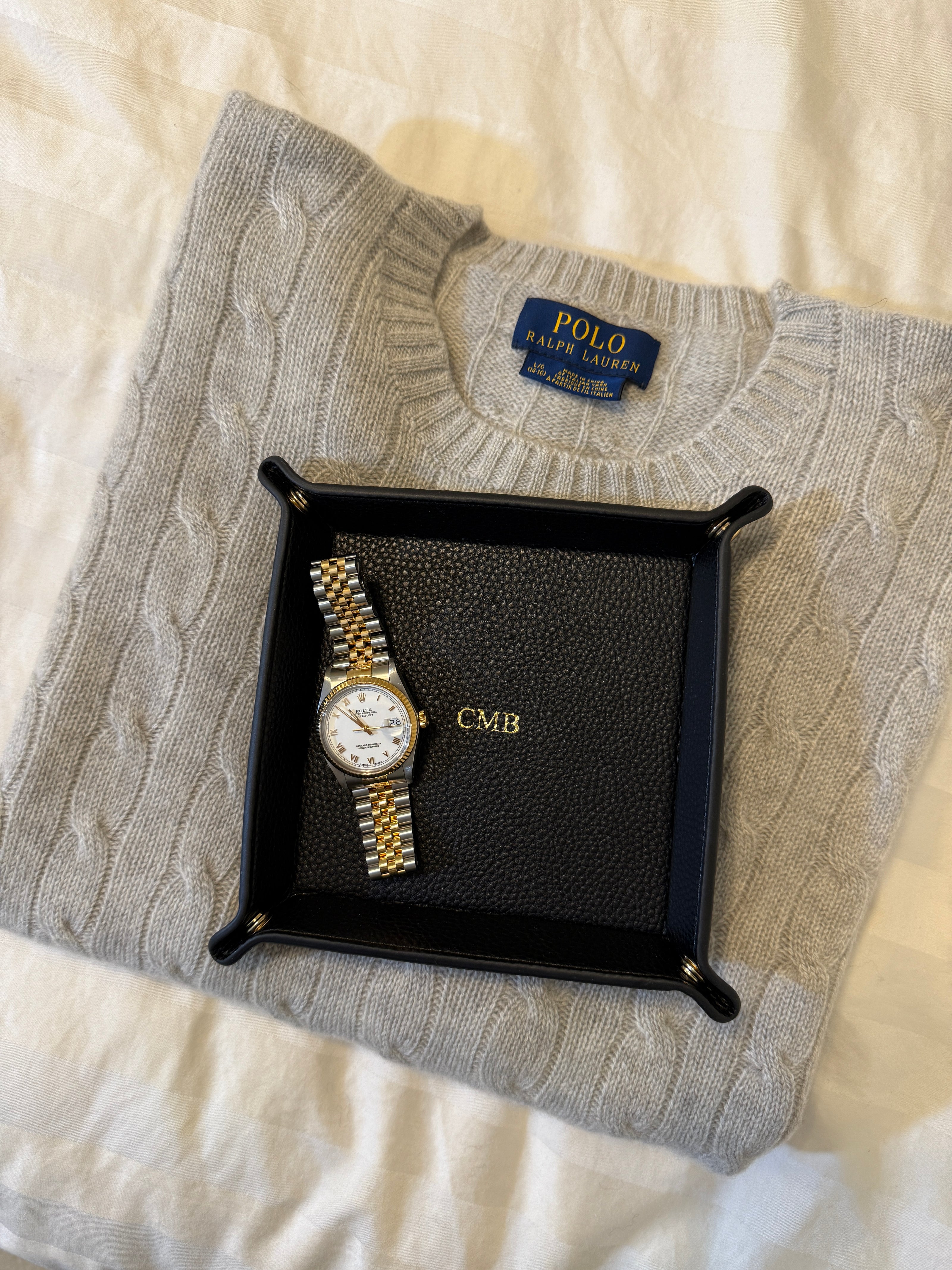 monogram catchall tray with sweater and watch